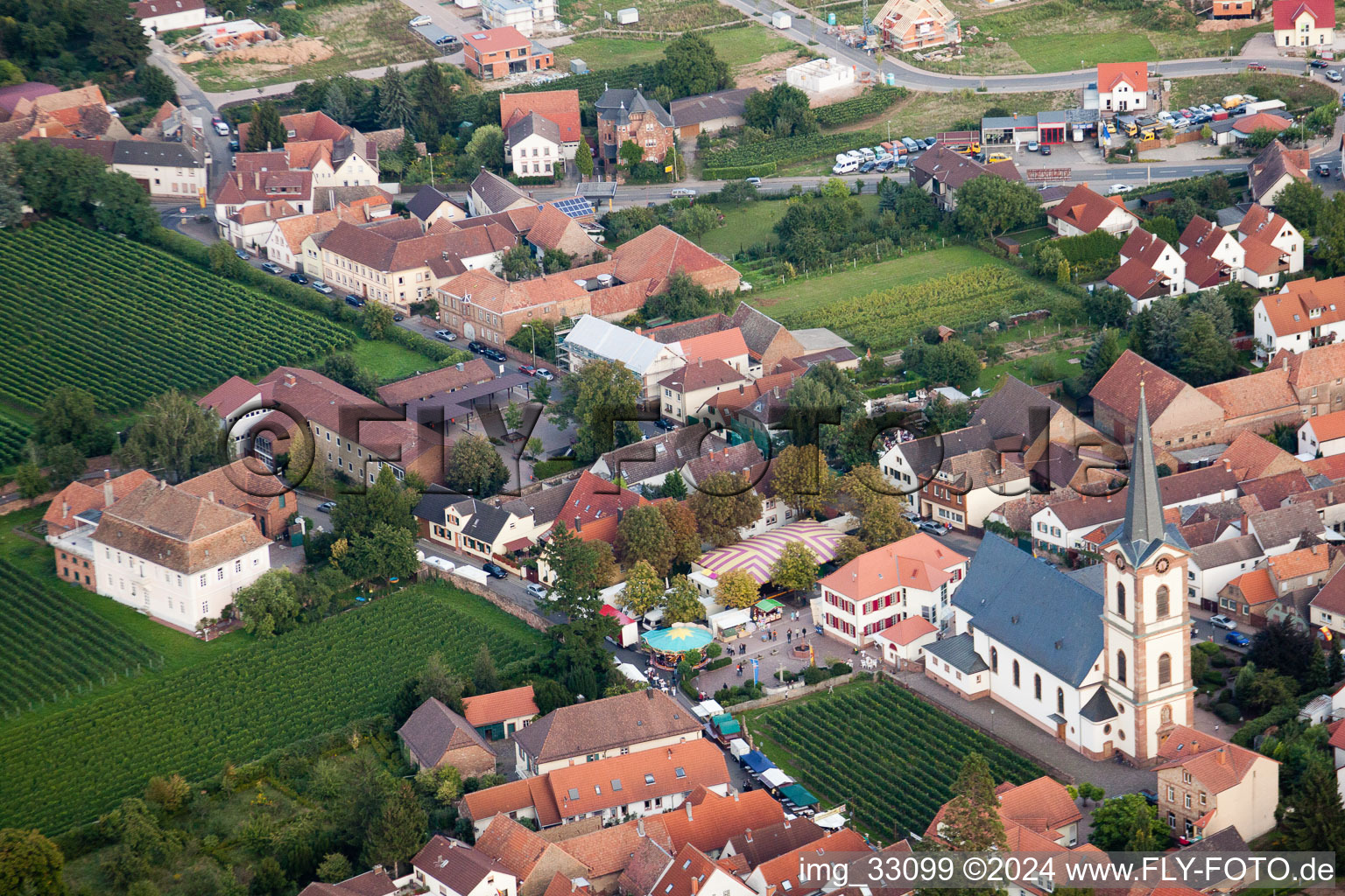 Aerial view of Church building St. Peter and Paul in the village of in Edesheim in the state Rhineland-Palatinate