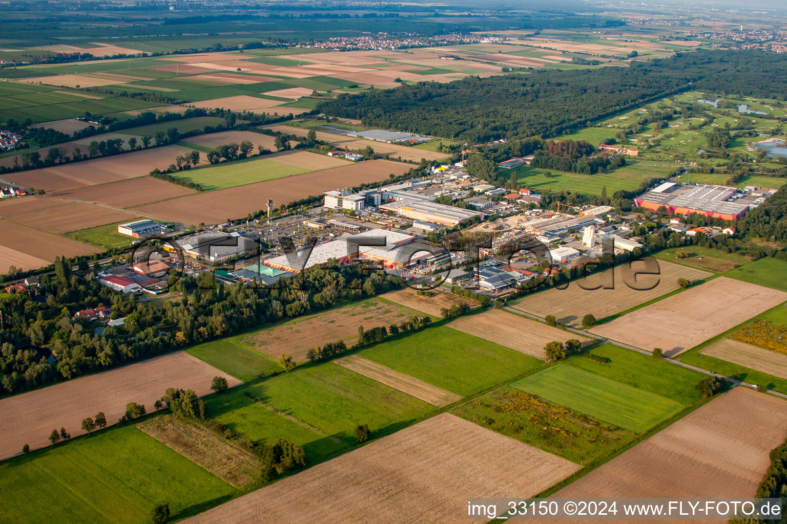 Oblique view of Bruchwiesenstrasse industrial area with Hornbach hardware store in Bornheim in the state Rhineland-Palatinate, Germany