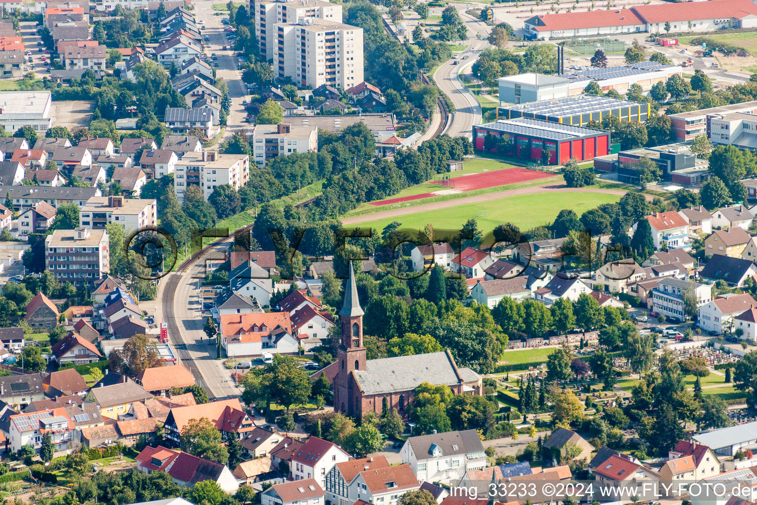 Aerial view of Church building Ev. Kirche Linkenheim in the district Linkenheim in Linkenheim-Hochstetten in the state Baden-Wurttemberg, Germany