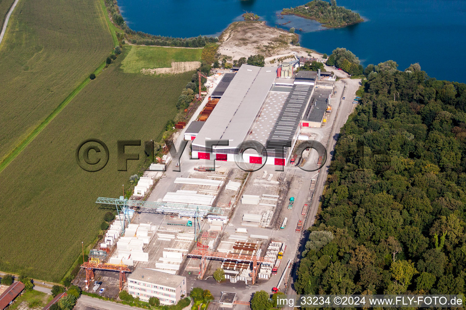 Aerial photograpy of Mixed concrete and building materials factory of Betonfertigteilewerk Linkenheim GmbH & Co. KG in Linkenheim-Hochstetten in the state Baden-Wurttemberg, Germany