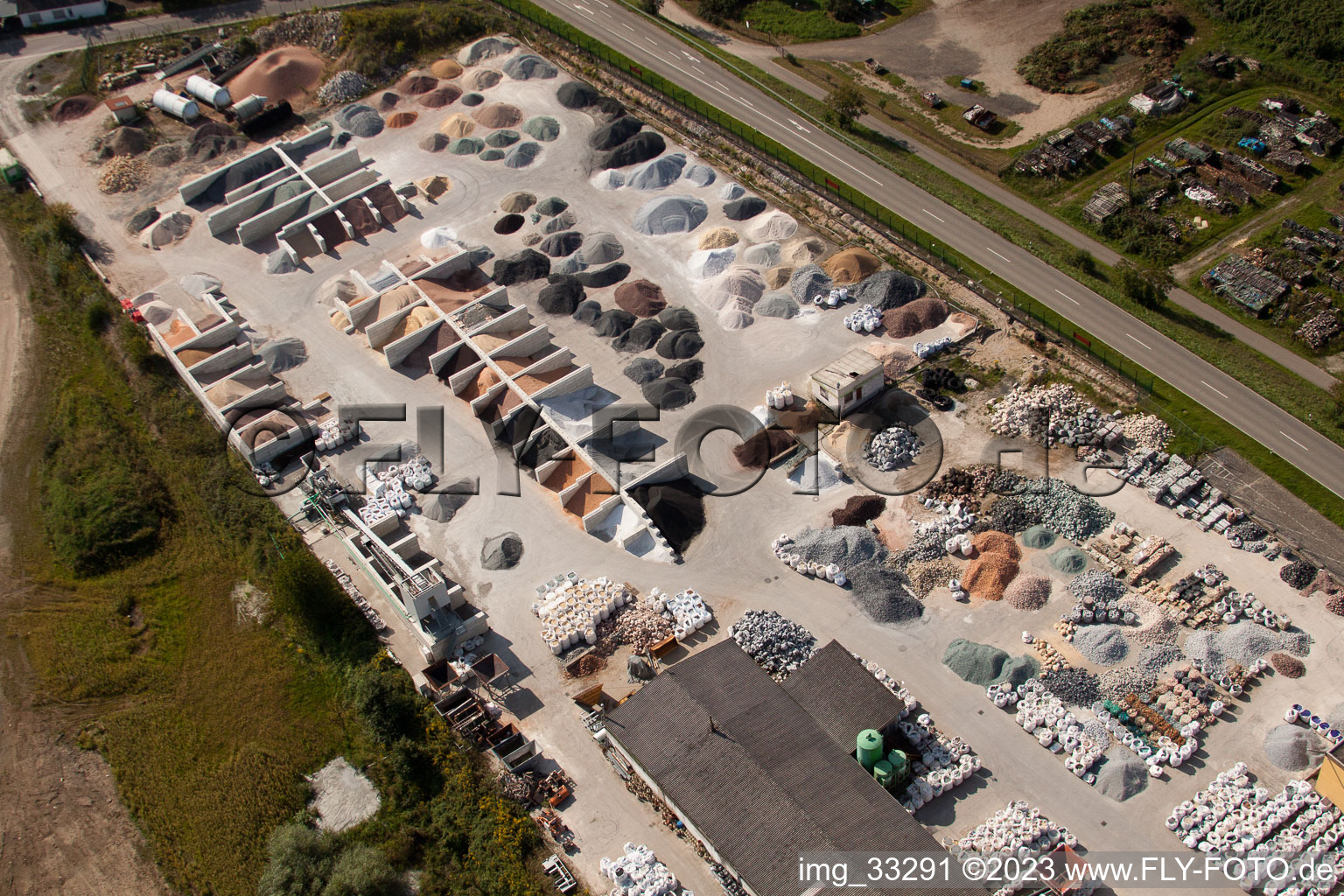 Bird's eye view of Garden gravel company, Badische Terrazzo Handelsgesellschaft mbH Huttenheimer Landstrasse 2-6 in the district Neudorf in Graben-Neudorf in the state Baden-Wuerttemberg, Germany