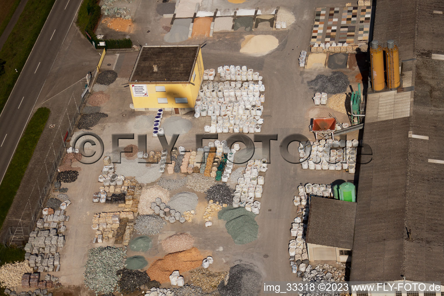 Drone image of Garden gravel company, Badische Terrazzo Handelsgesellschaft mbH Huttenheimer Landstrasse 2-6 in the district Neudorf in Graben-Neudorf in the state Baden-Wuerttemberg, Germany