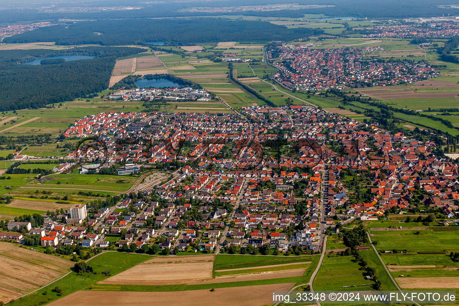 Aerial photograpy of Town View of the streets and houses of the residential areas in the district Spoeck in Stutensee in the state Baden-Wurttemberg, Germany