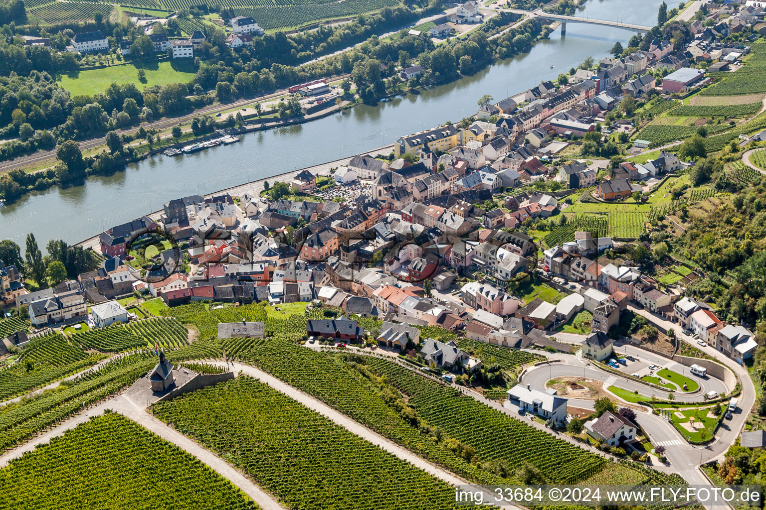 Aerial view of Village on the river bank areas of the river Mosel in Wormeldange in Grevenmacher, Luxembourg