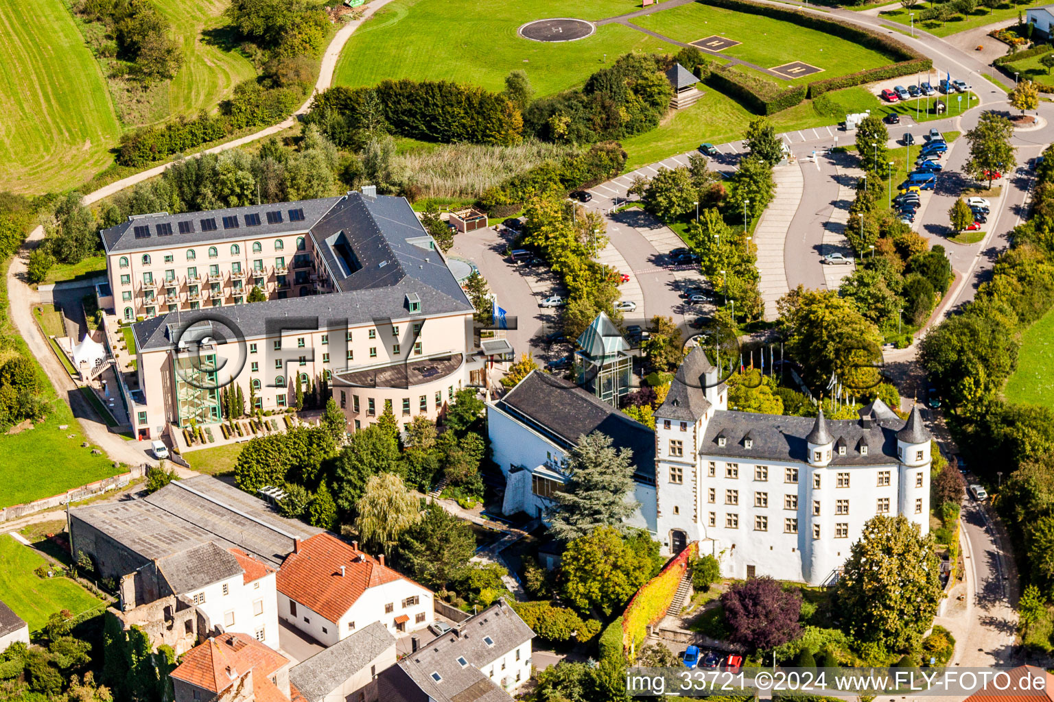 Oblique view of Complex of the hotel building Victor's Residenz-Hotel Schloss Berg and Niederburg Nennig in Perl in the state Saarland, Germany