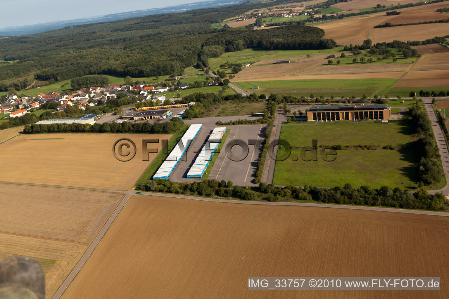 Aerial view of Freight forwarding building a logistics and transport company Fixemer Logistics GmbH, International Transport & Logistics Services in Perl in the state Saarland, Germany