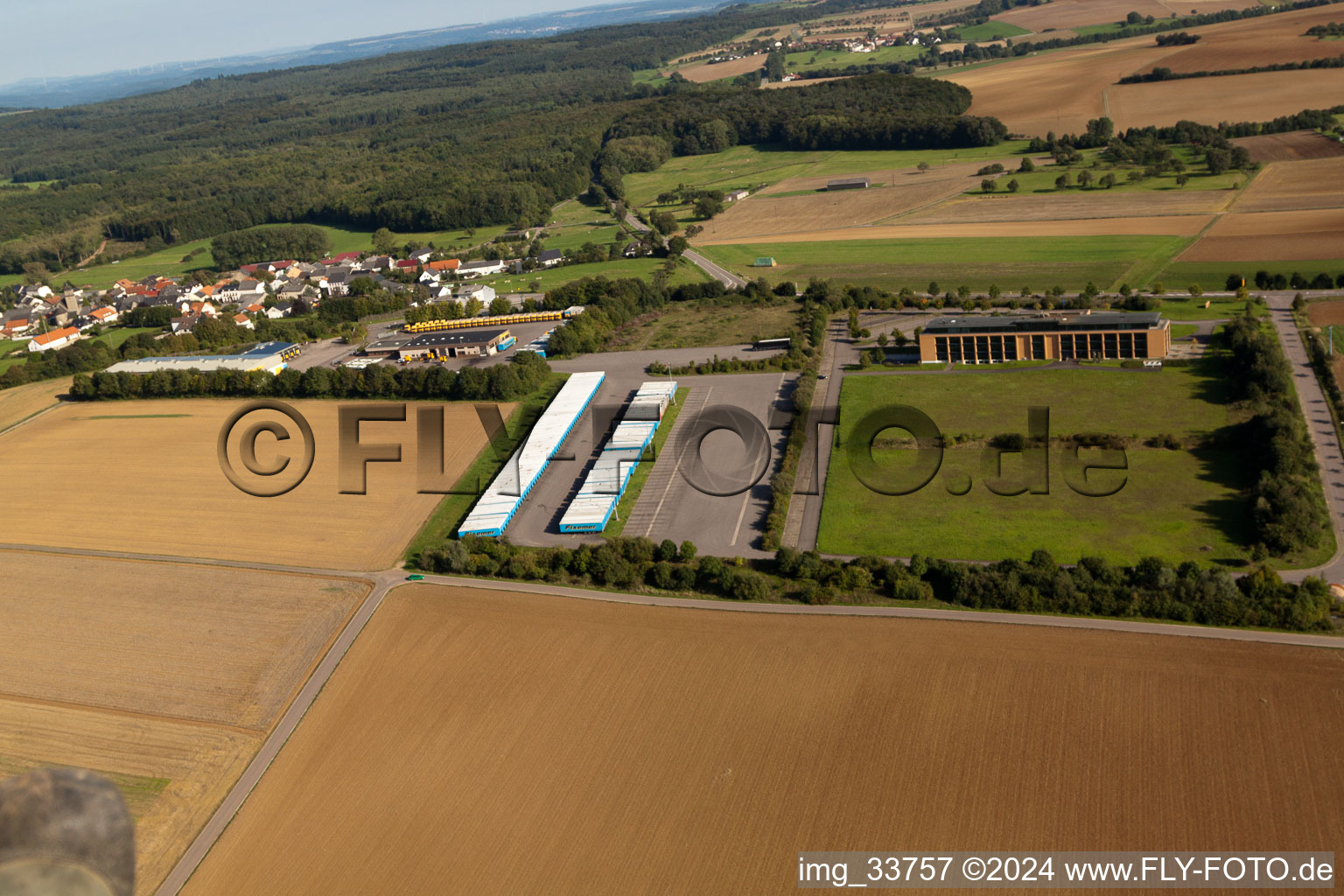 Aerial view of Freight forwarding building a logistics and transport company Fixemer Logistics GmbH, International Transport & Logistics Services in Perl in the state Saarland, Germany