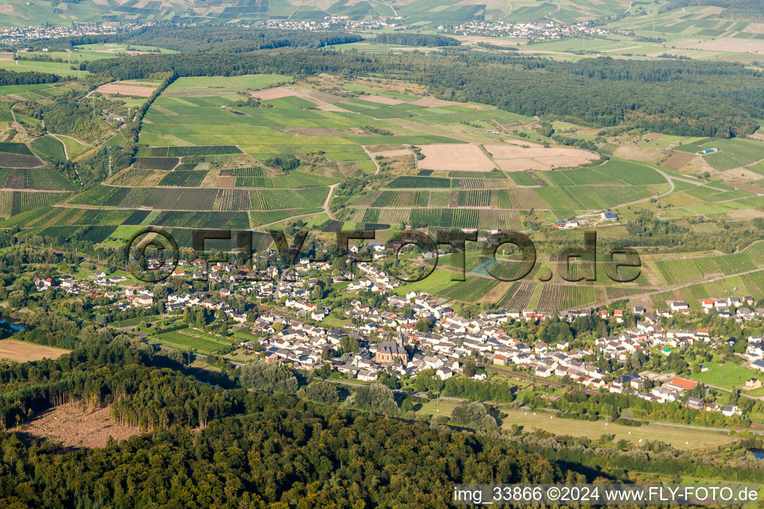 Village - view on the edge of agricultural fields and farmland in Wawern in the state Rhineland-Palatinate, Germany