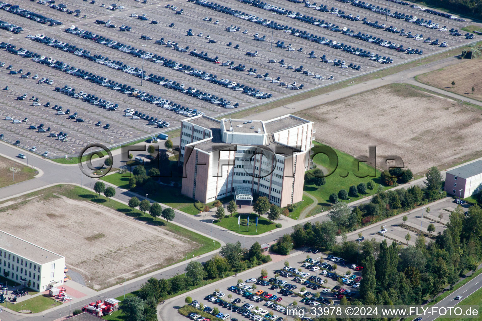 Daimler GLC on the island of green in Germersheim in the state Rhineland-Palatinate, Germany seen from above