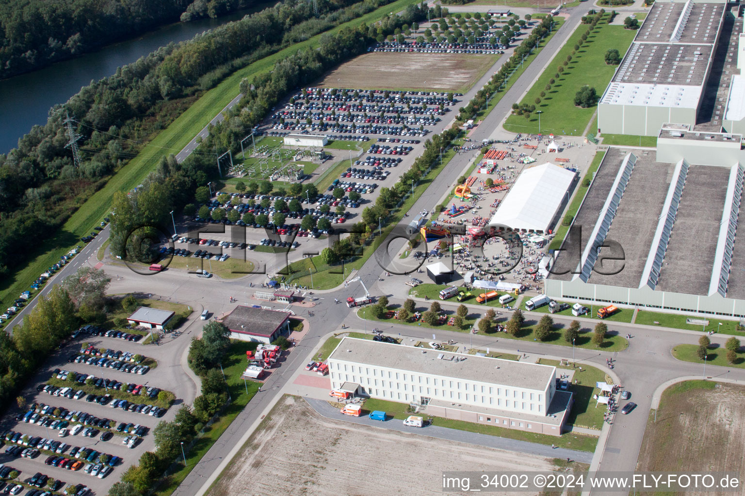 Daimler GLC on the island of green in Germersheim in the state Rhineland-Palatinate, Germany from the drone perspective