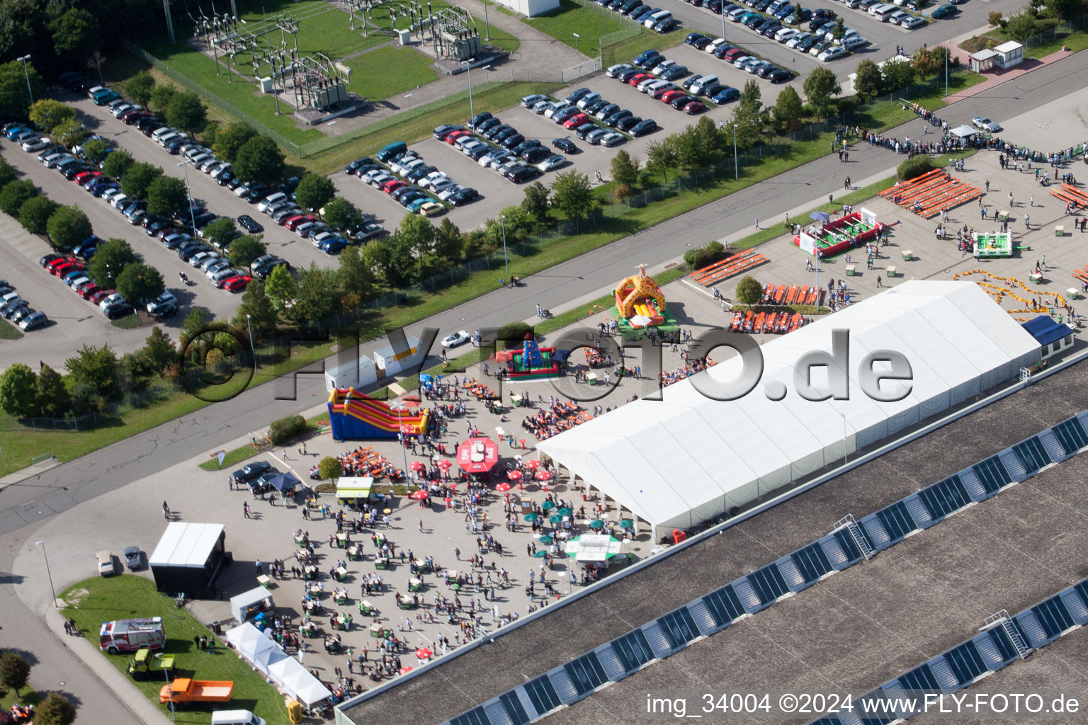 Daimler GLC on the island of green in Germersheim in the state Rhineland-Palatinate, Germany from a drone