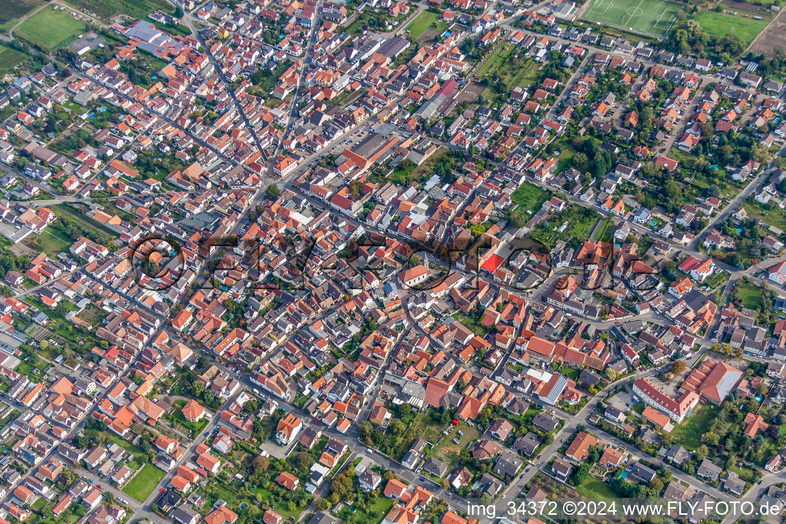 Aerial view of Town View of the streets and houses of the residential areas in Weisenheim am Sand in the state Rhineland-Palatinate, Germany