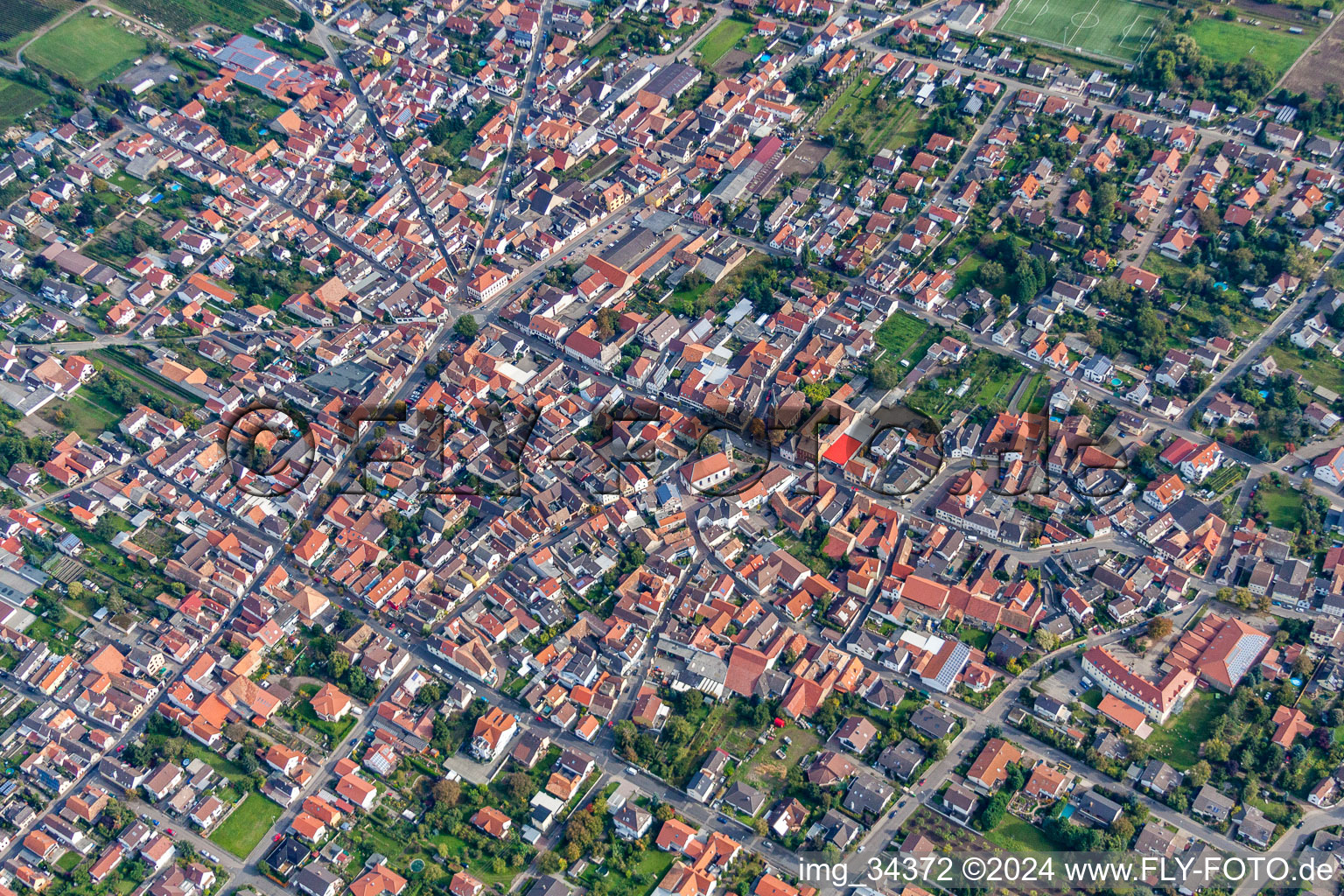 Aerial view of Town View of the streets and houses of the residential areas in Weisenheim am Sand in the state Rhineland-Palatinate, Germany