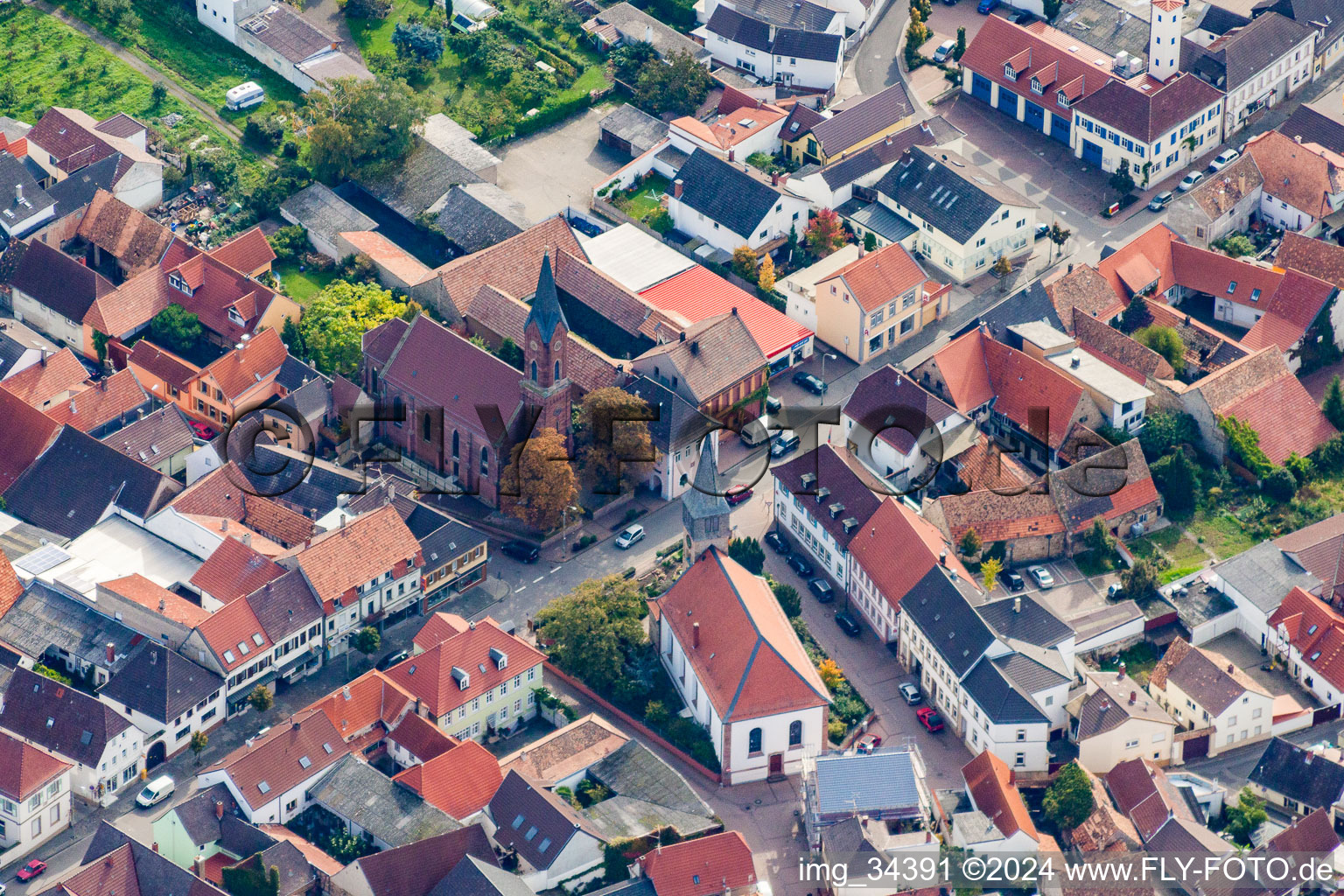 Aerial view of Two Church building in the village of in Weisenheim am Berg in the state Rhineland-Palatinate, Germany