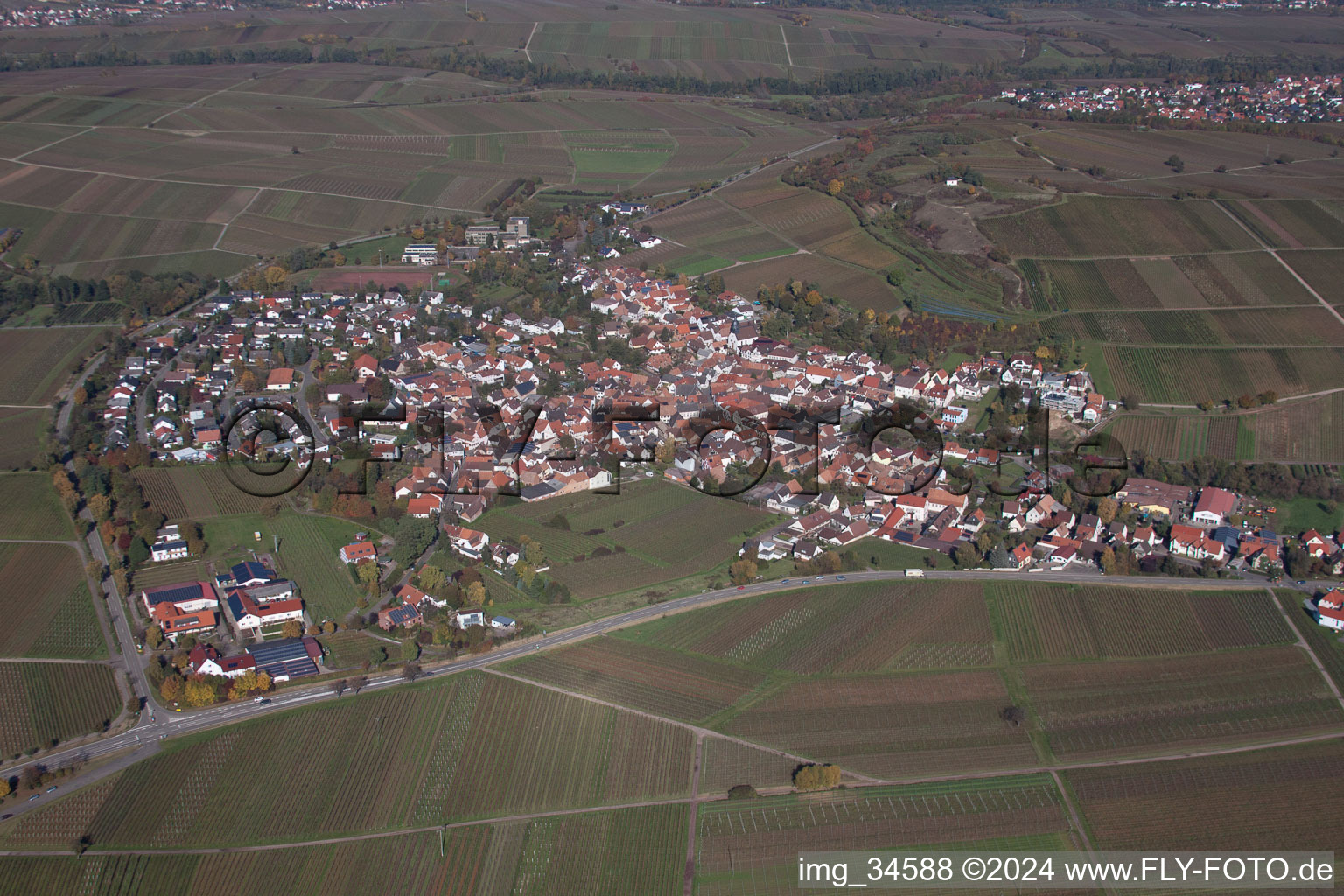 Village - view on the edge of agricultural fields and farmland in Ilbesheim bei Landau in der Pfalz in the state Rhineland-Palatinate, Germany