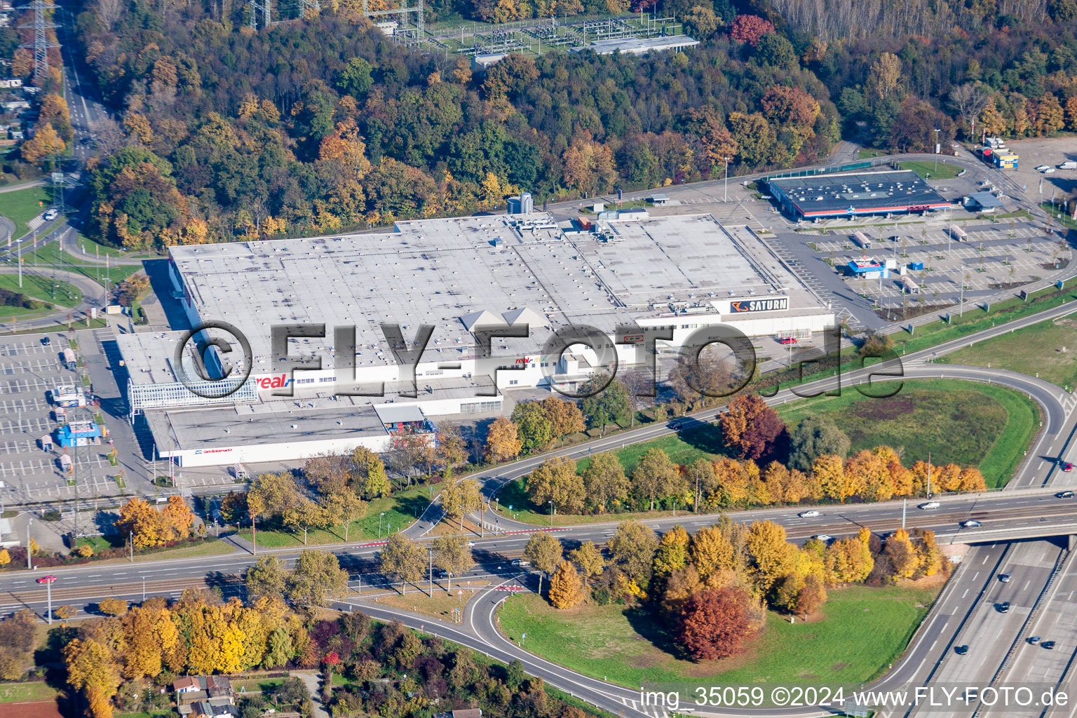 Building of the shopping center real,- SB-Warenhaus GmbH and Saturn in the district Rintheim in Karlsruhe in the state Baden-Wurttemberg, Germany