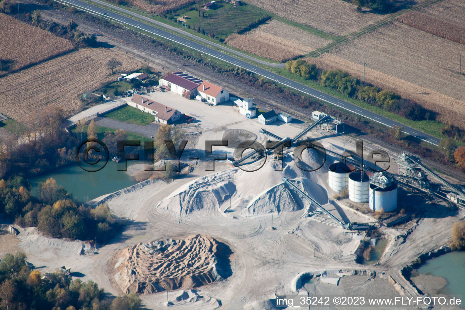 Aerial view of Gravel works in Hagenbach in the state Rhineland-Palatinate, Germany