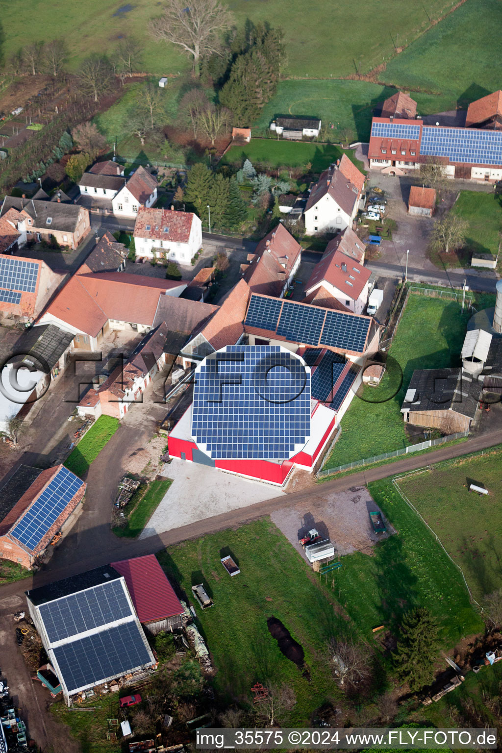 Aerial photograpy of Panel rows of photovoltaic turnable roof of a stable in the district Deutschhof in Kapellen-Drusweiler in the state Rhineland-Palatinate