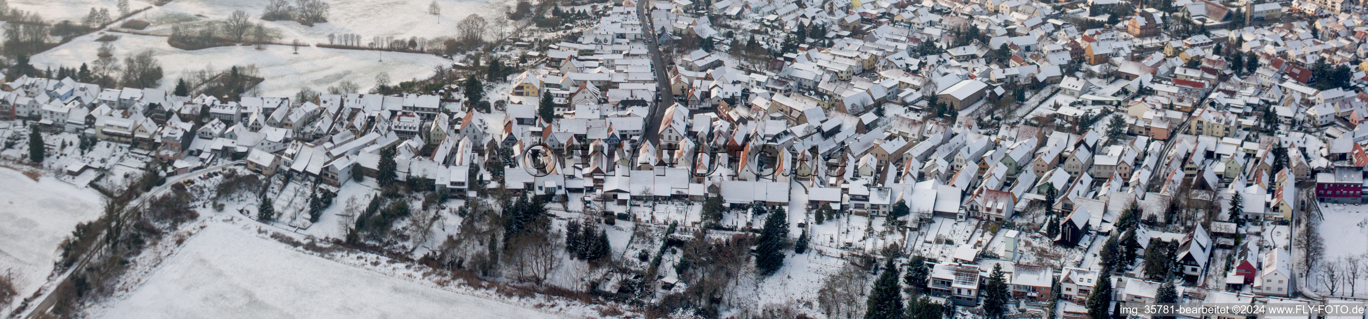 Wintry snowy Village view in Jockgrim in the state Rhineland-Palatinate, Germany