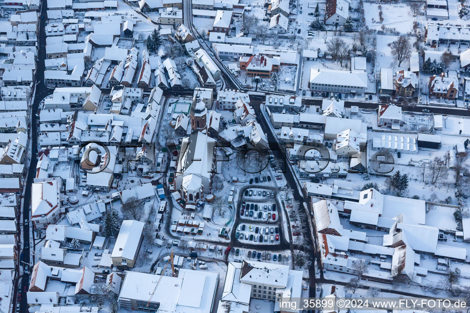 Christmas market at Plätzl and around St. George's Church in Kandel in the state Rhineland-Palatinate, Germany seen from above