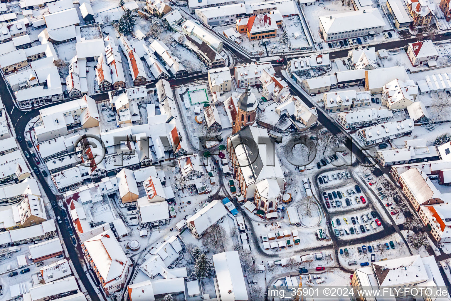 Aerial view of St. George's Church in winter with snow in Kandel in the state Rhineland-Palatinate, Germany