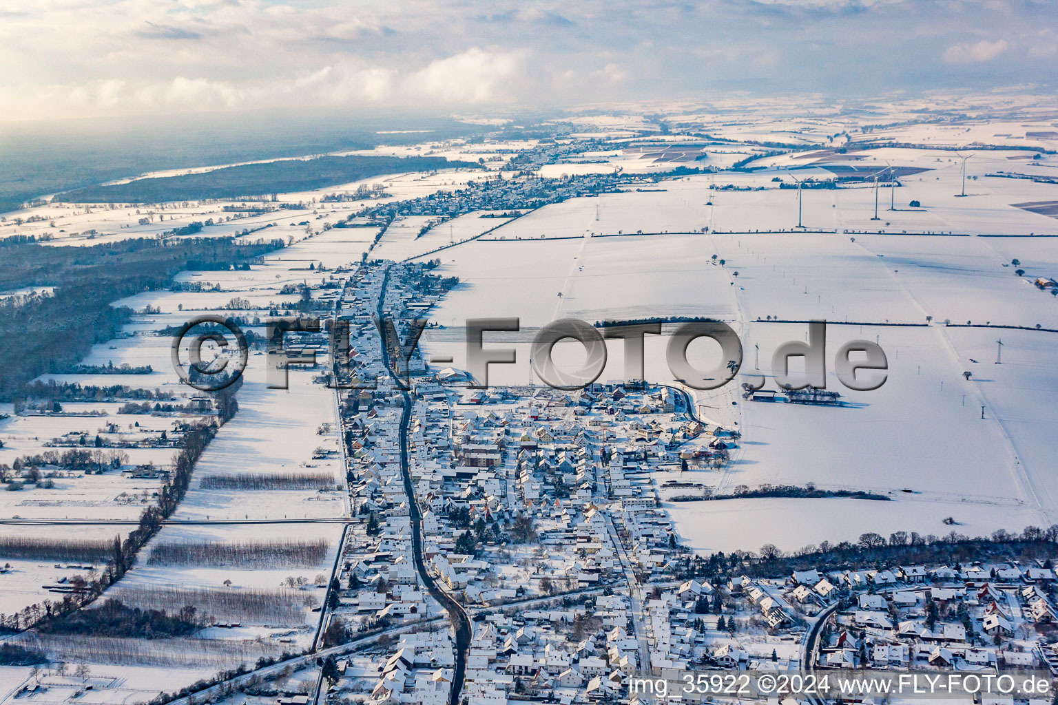 Oblique view of Saarstrasse in winter with snow in Kandel in the state Rhineland-Palatinate, Germany