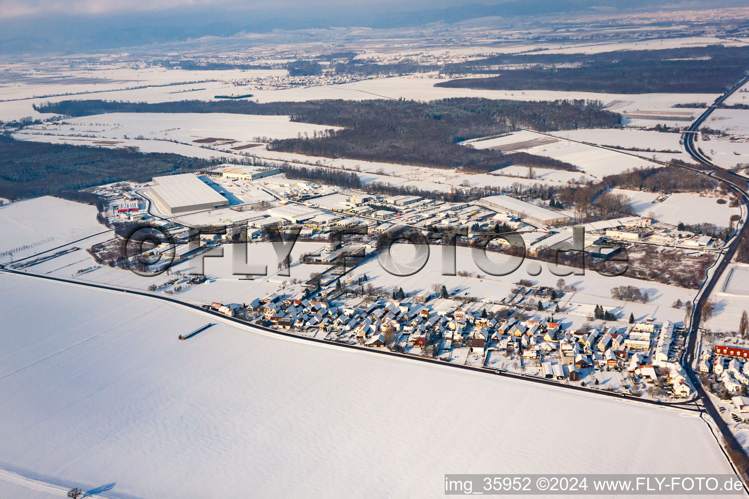 Aerial view of In winter when there is snow in the district Minderslachen in Kandel in the state Rhineland-Palatinate, Germany