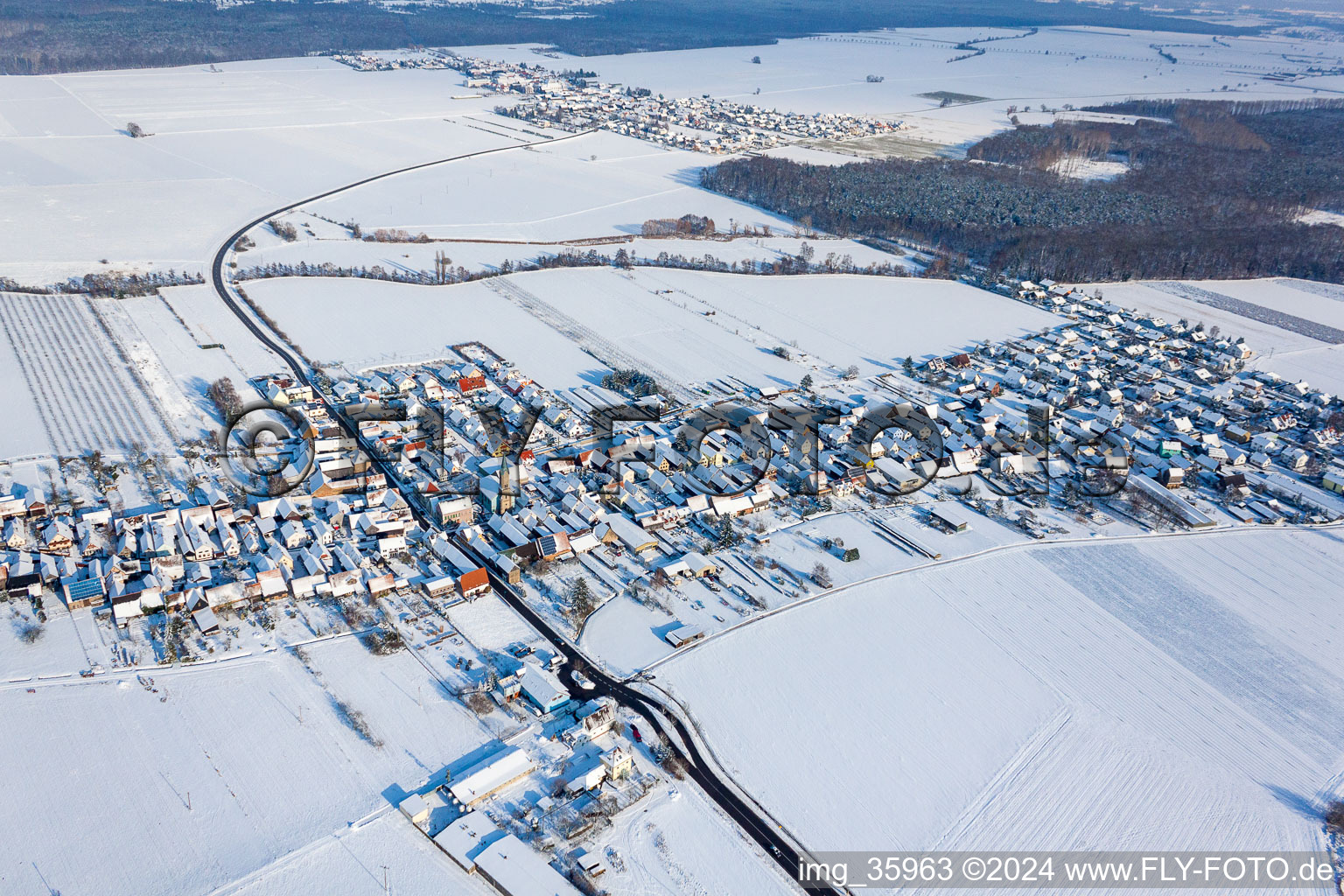 Winter snow covered village view in Erlenbach bei Kandel in the state Rhineland-Palatinate, Germany