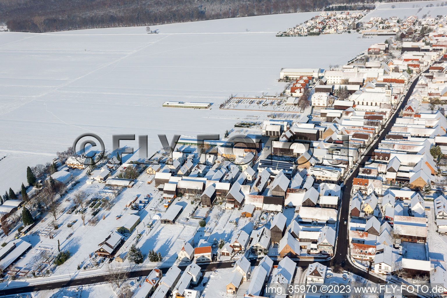 Oblique view of In winter/snow in the district Hayna in Herxheim bei Landau in the state Rhineland-Palatinate, Germany