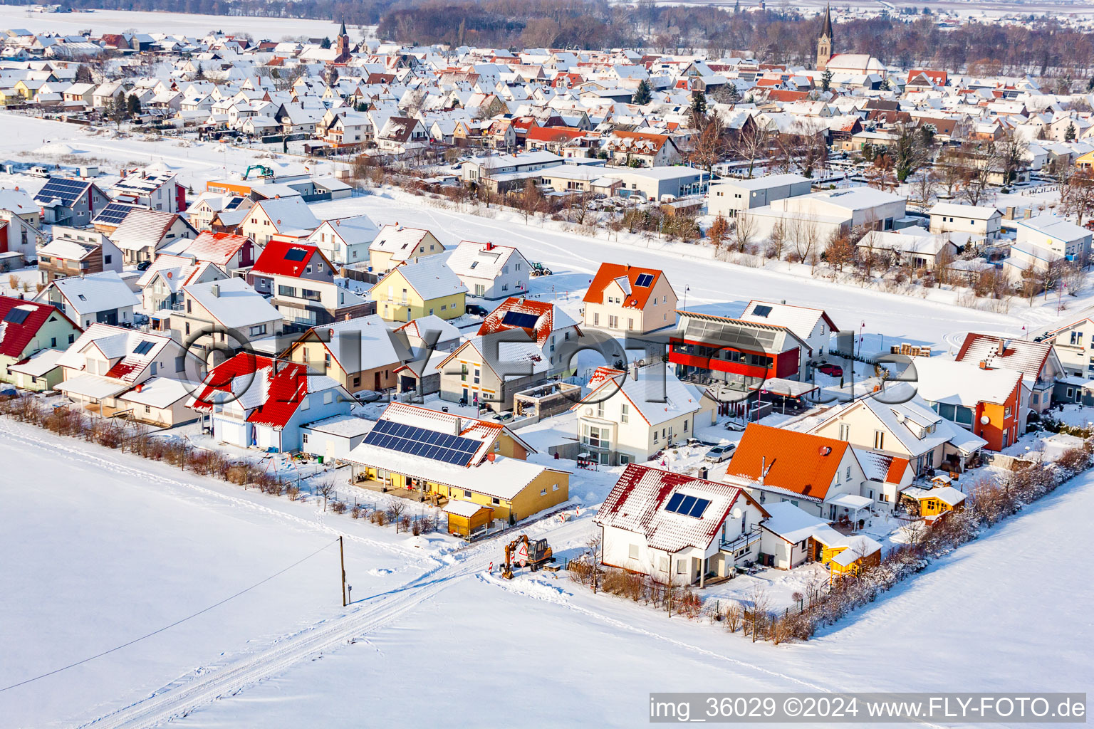 New development area Brotäcker in winter with snow in Steinweiler in the state Rhineland-Palatinate, Germany