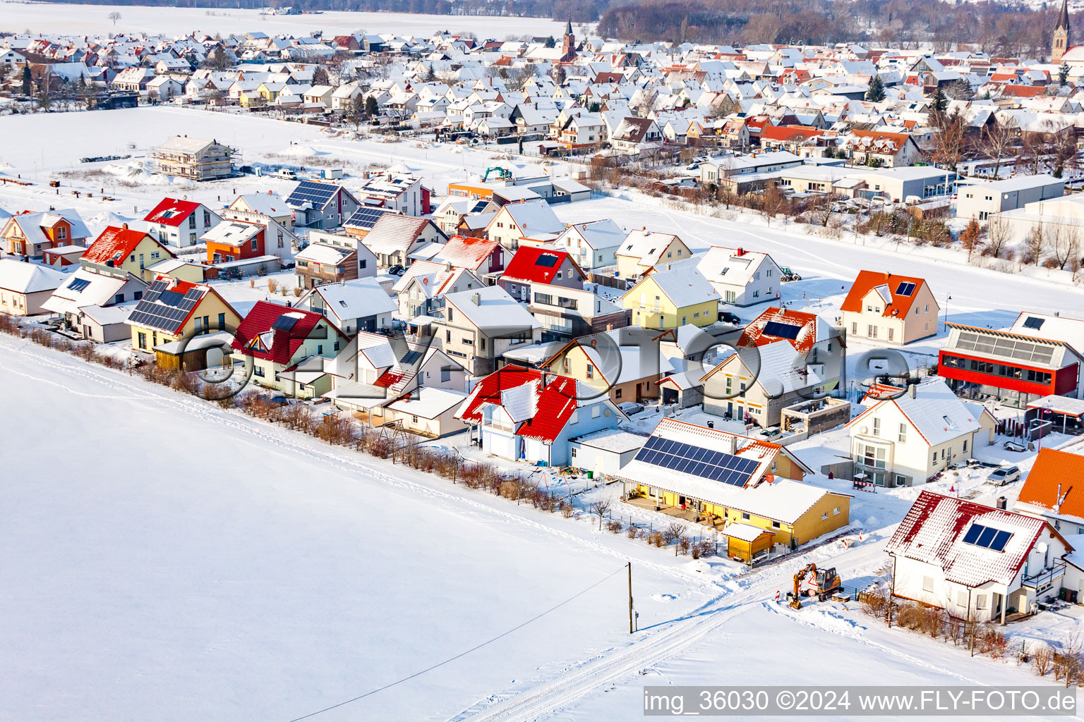 Aerial view of Brotäcker development area in winter with snow in Steinweiler in the state Rhineland-Palatinate, Germany