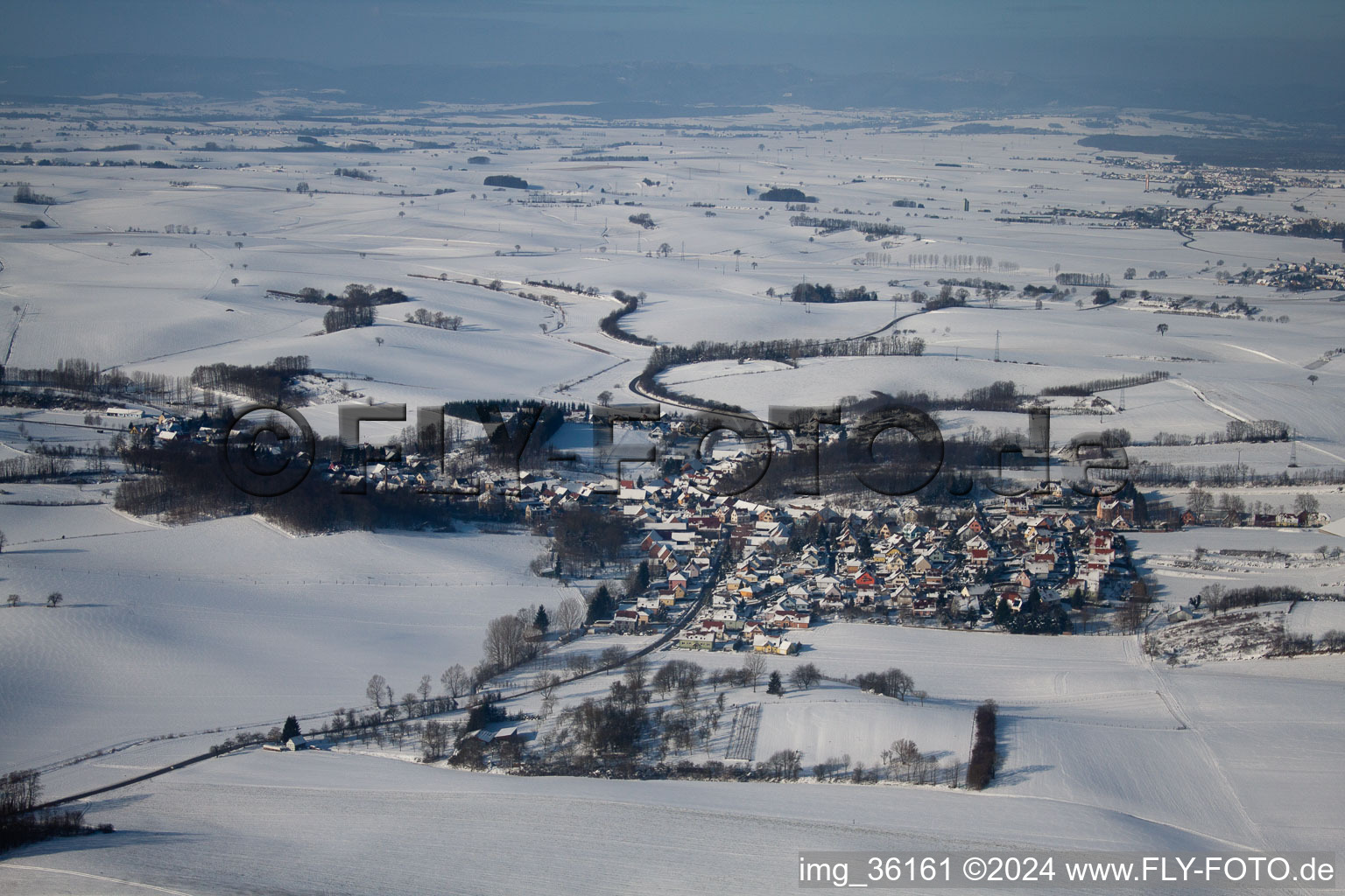 Aerial view of In winter when there is snow in Neewiller-près-Lauterbourg in the state Bas-Rhin, France