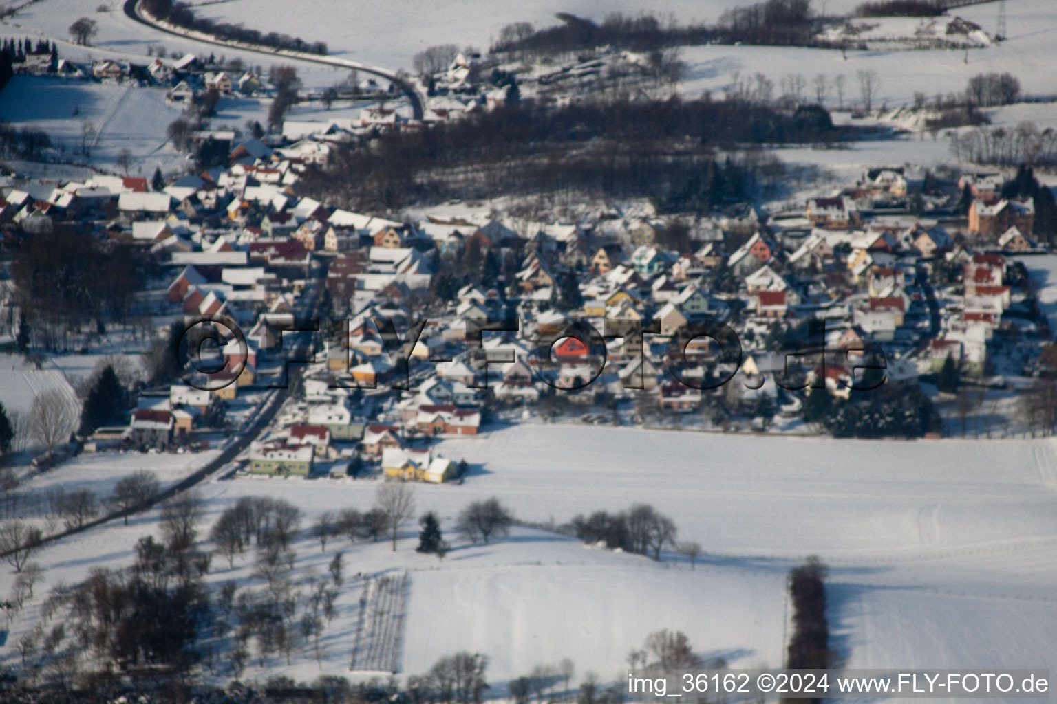 Aerial photograpy of In winter when there is snow in Neewiller-près-Lauterbourg in the state Bas-Rhin, France