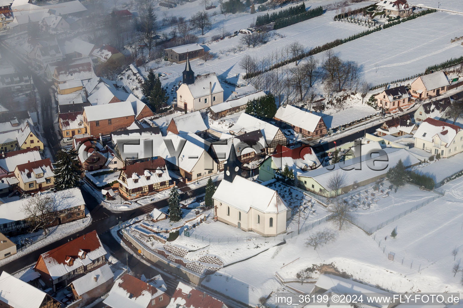 Wintry snowy Church building Eglise protestante de Wintzenbach in Wintzenbach in Grand Est, France