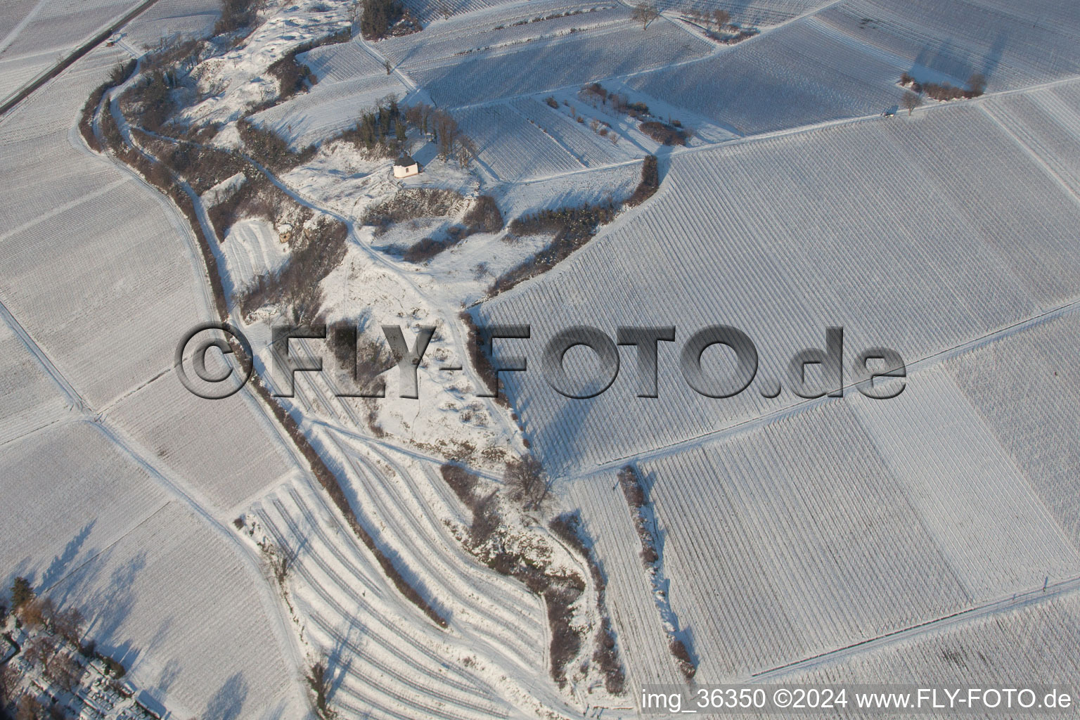 Aerial view of Small Kalmit in winter when there is snow in Ilbesheim bei Landau in der Pfalz in the state Rhineland-Palatinate, Germany
