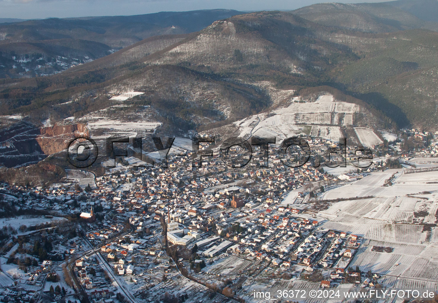 Aerial view of Winterly Town View of the streets and houses of the residential areas in Albersweiler in the state Rhineland-Palatinate