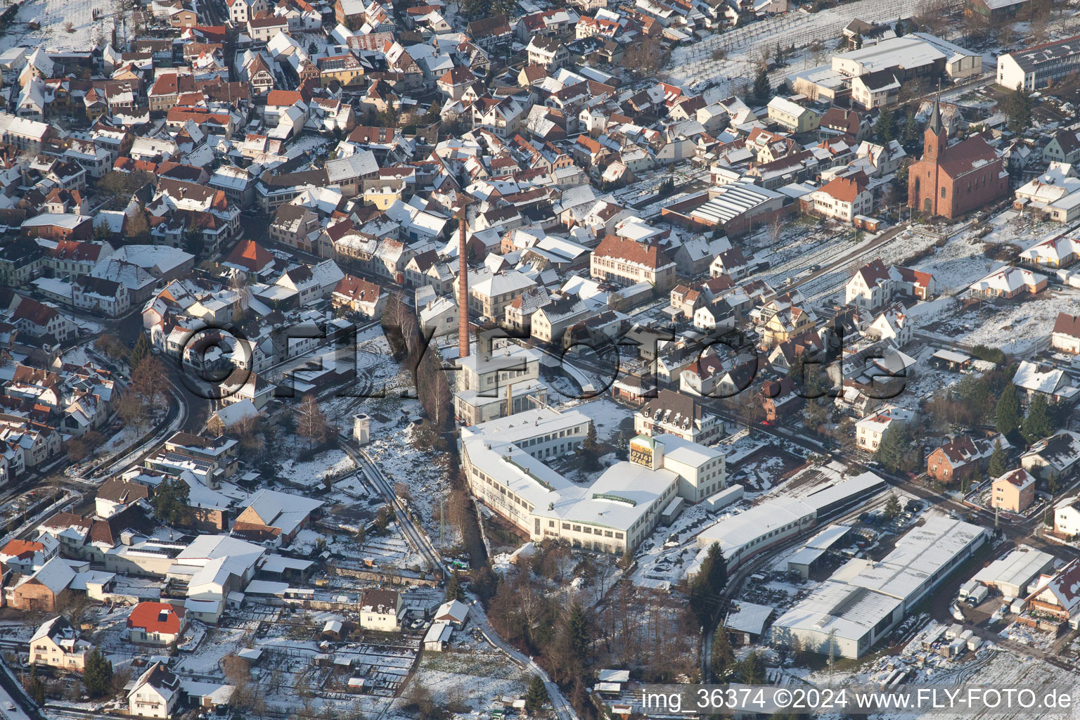 Aerial photograpy of Winterly Town View of the streets and houses of the residential areas in Albersweiler in the state Rhineland-Palatinate