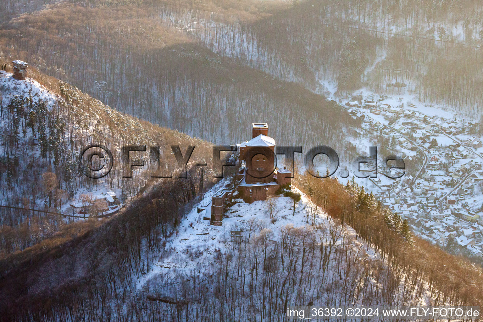 Trifels Castle in the snow in Annweiler am Trifels in the state Rhineland-Palatinate, Germany