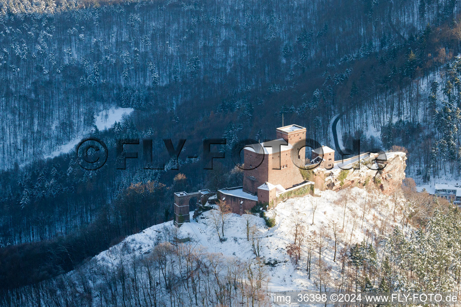 Aerial view of Trifels Castle in the snow in Annweiler am Trifels in the state Rhineland-Palatinate, Germany