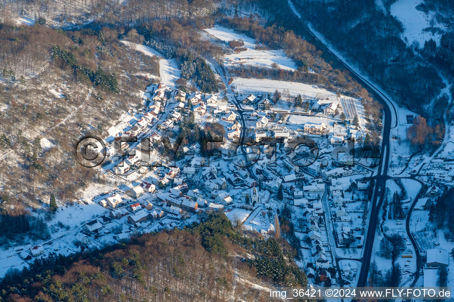 Wintry snowy Village view in Waldhambach in the state Rhineland-Palatinate, Germany