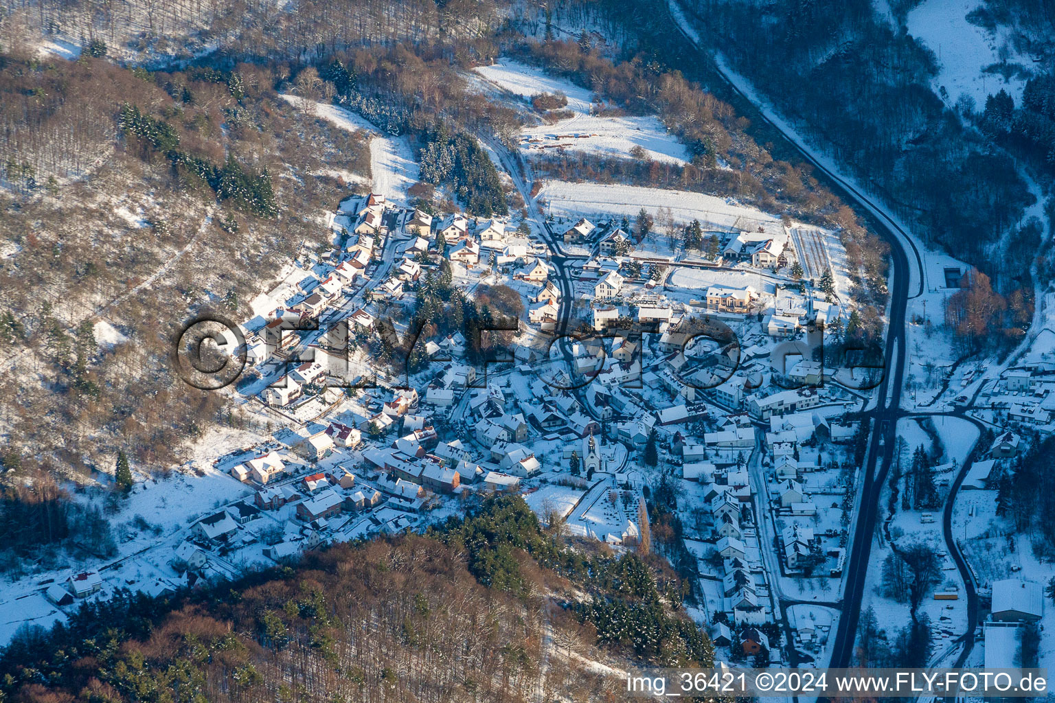 Winter snow covered village view in Waldhambach in the state Rhineland-Palatinate, Germany