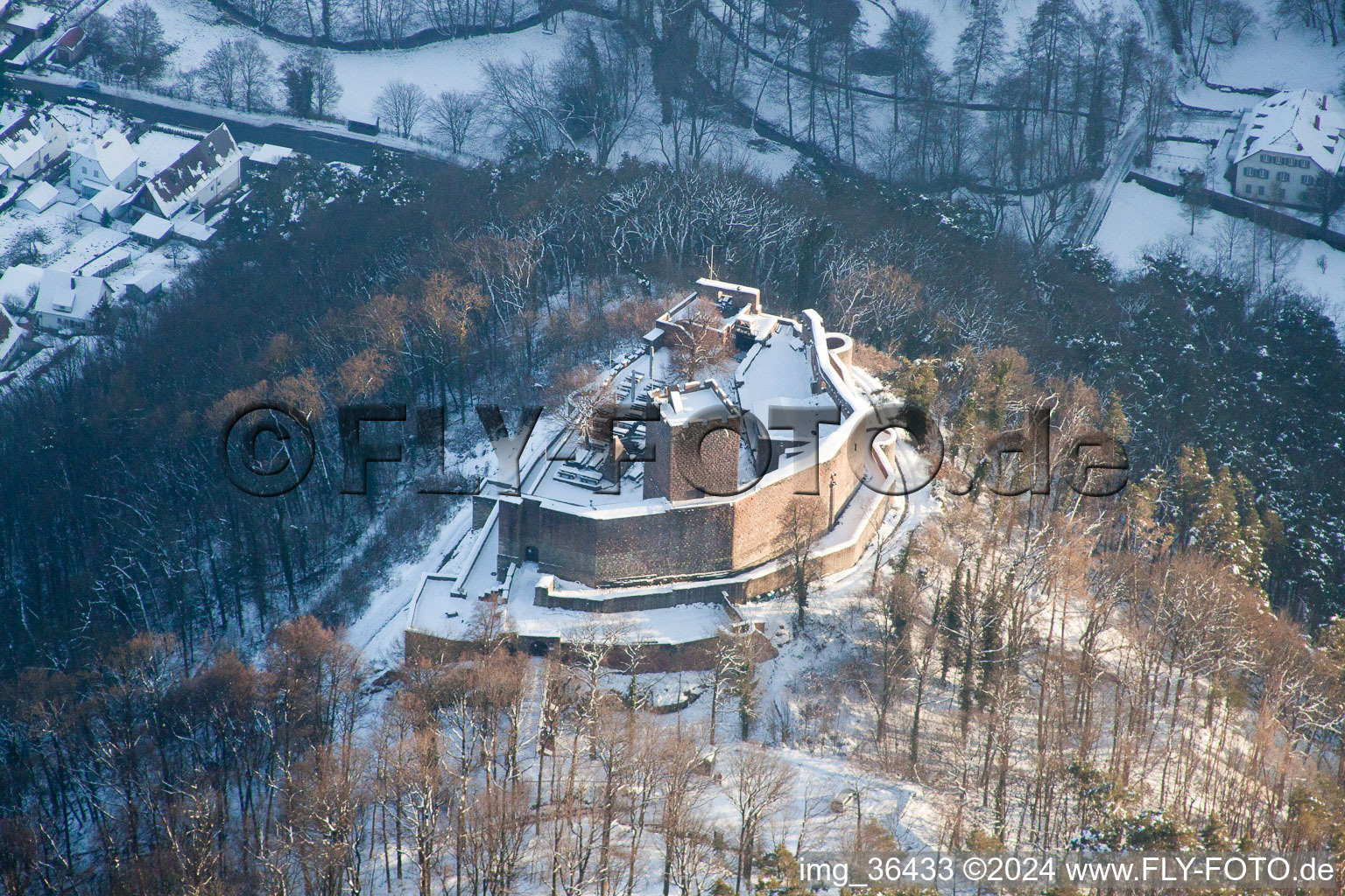 Wintry snowy ruins and vestiges of the former castle Landeck in Klingenmuenster in the state Rhineland-Palatinate during Winter