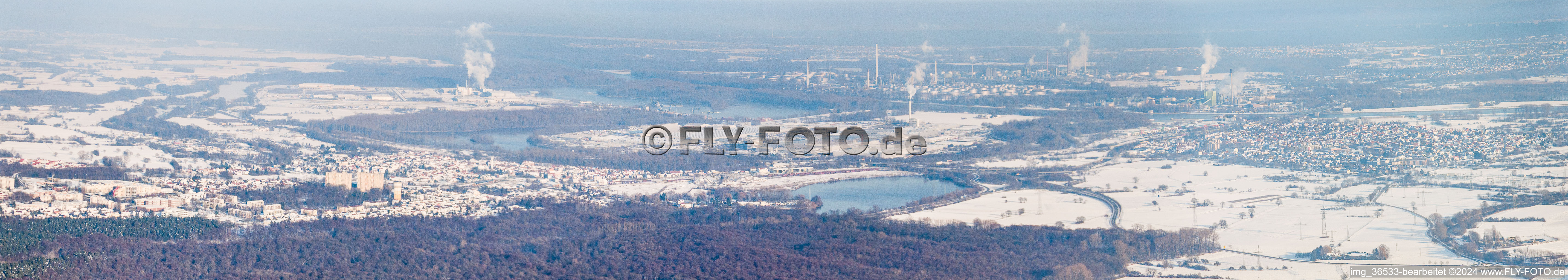 Panorama of the winter snow-covered city from the southwest in the district Maximiliansau in Wörth am Rhein in the state Rhineland-Palatinate, Germany