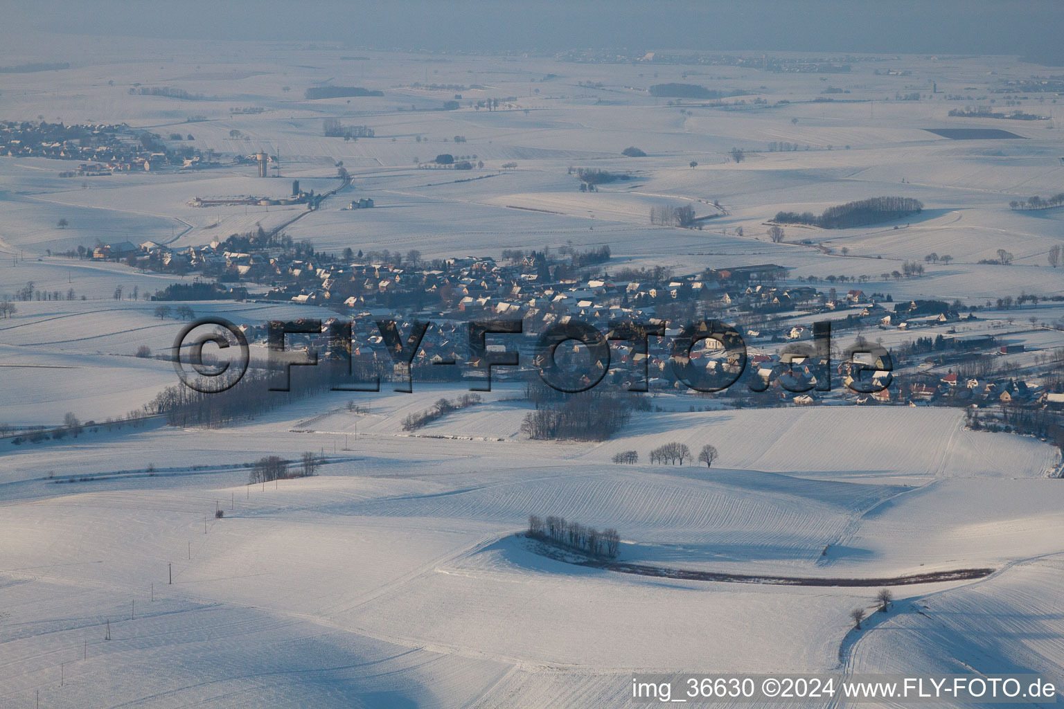 In winter when there is snow in Neewiller-près-Lauterbourg in the state Bas-Rhin, France from above