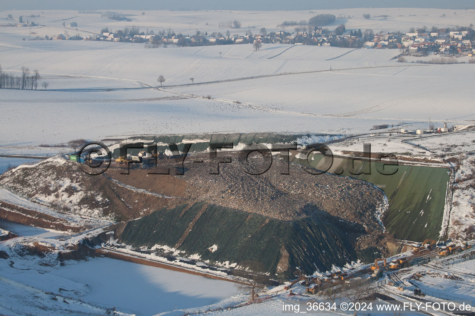 Landfill with flocks of birds in Schaffhouse-près-Seltz in the state Bas-Rhin, France