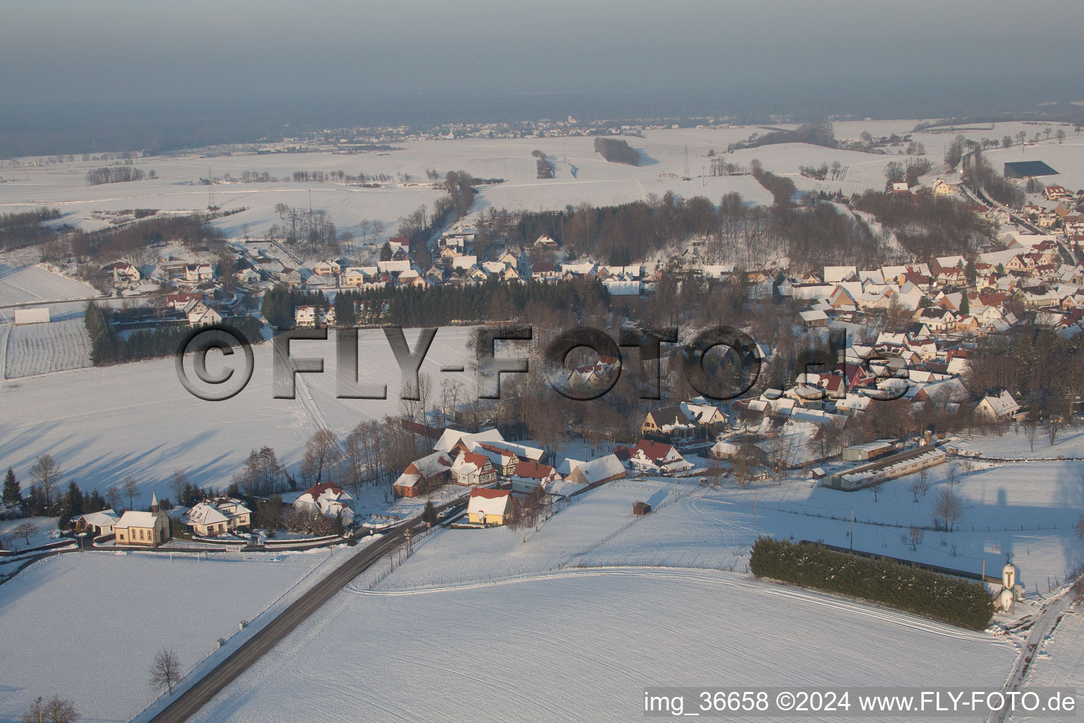 In winter when there is snow in Neewiller-près-Lauterbourg in the state Bas-Rhin, France from the plane