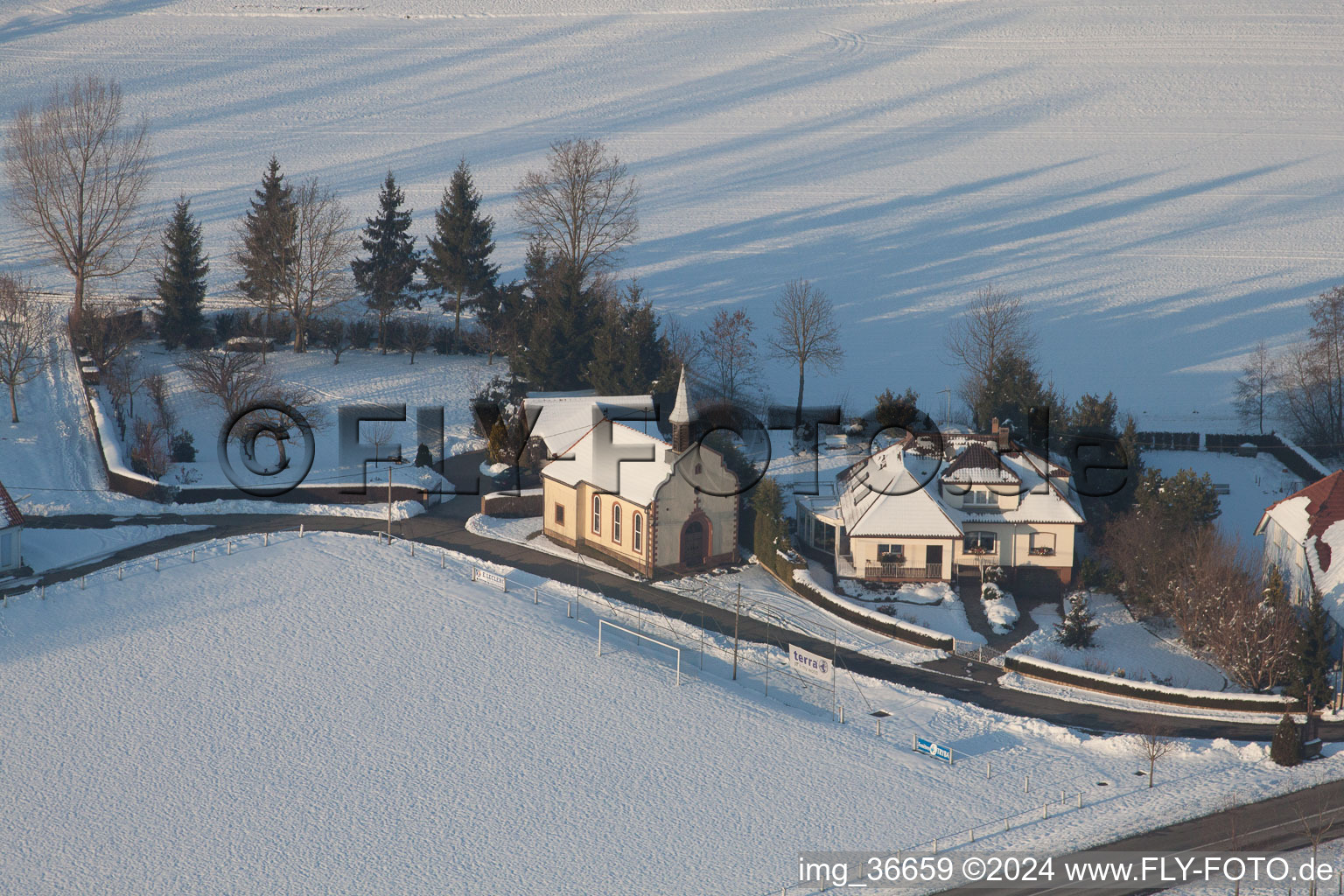 Bird's eye view of In winter when there is snow in Neewiller-près-Lauterbourg in the state Bas-Rhin, France