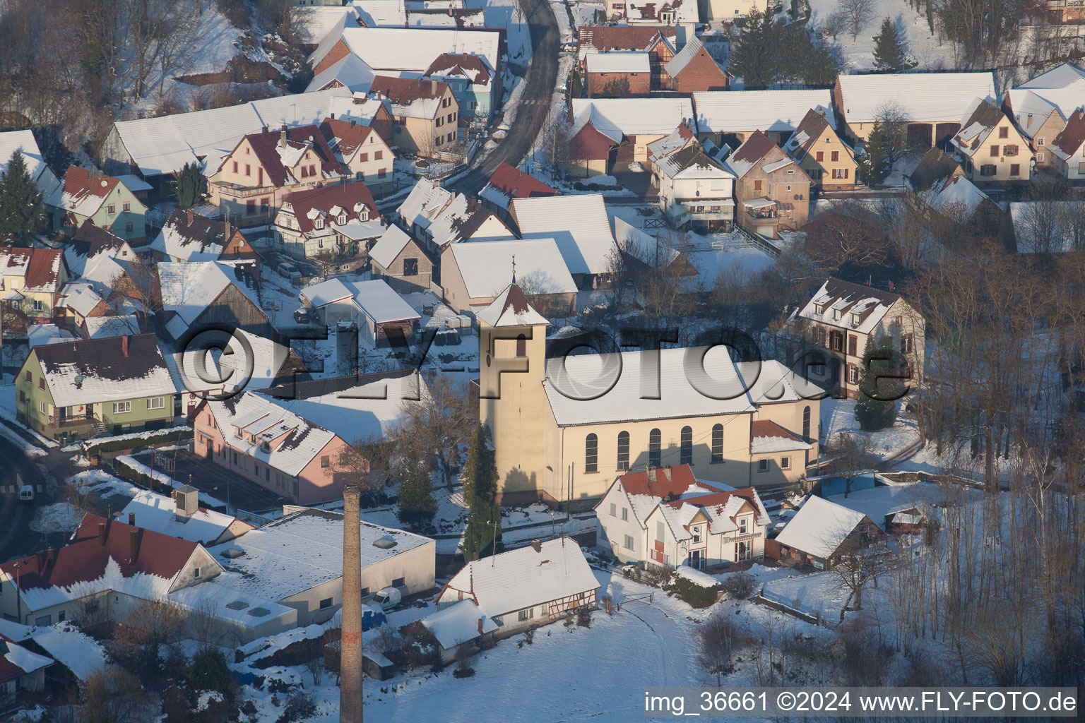 Drone recording of In winter when there is snow in Neewiller-près-Lauterbourg in the state Bas-Rhin, France