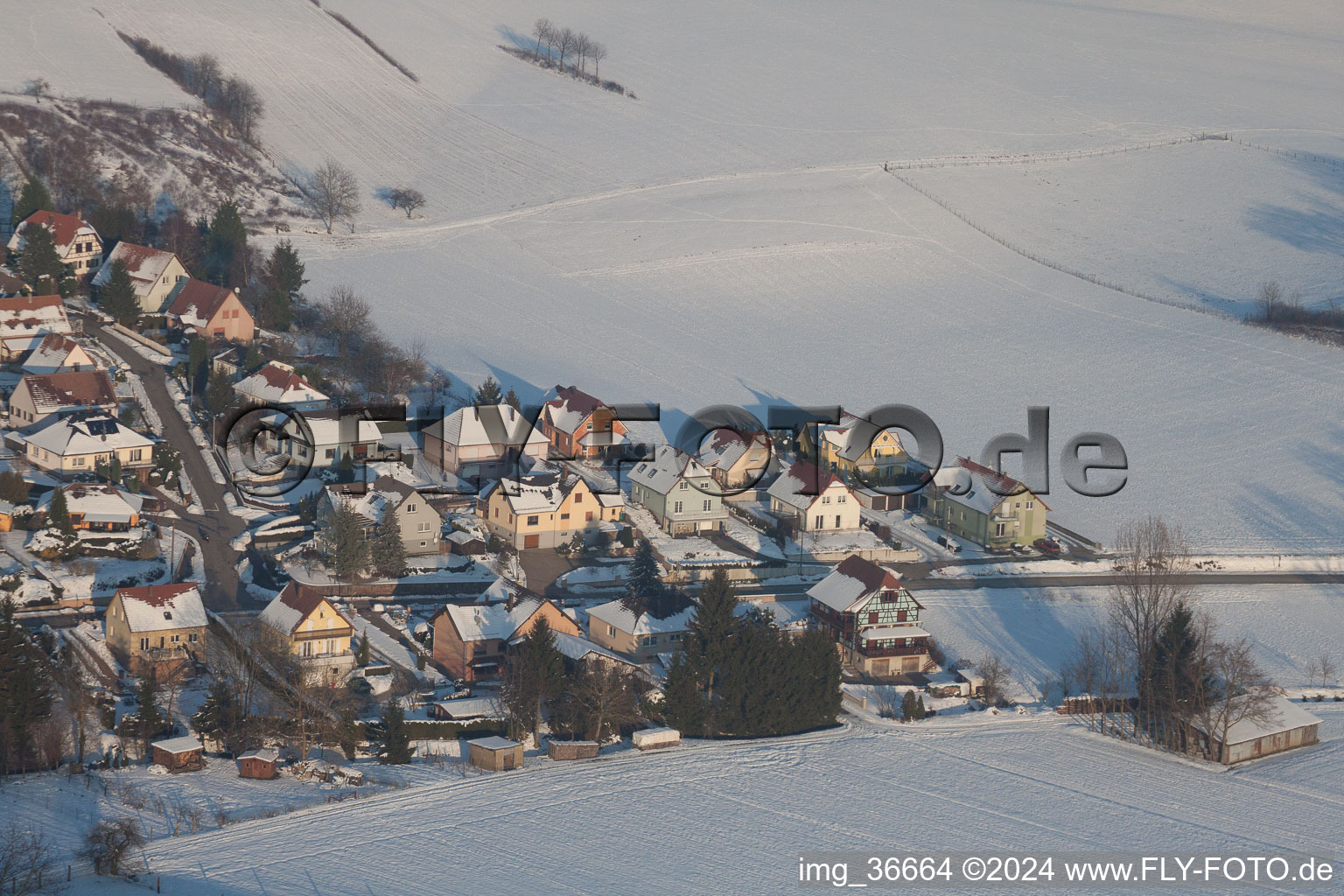 In winter when there is snow in Neewiller-près-Lauterbourg in the state Bas-Rhin, France from a drone