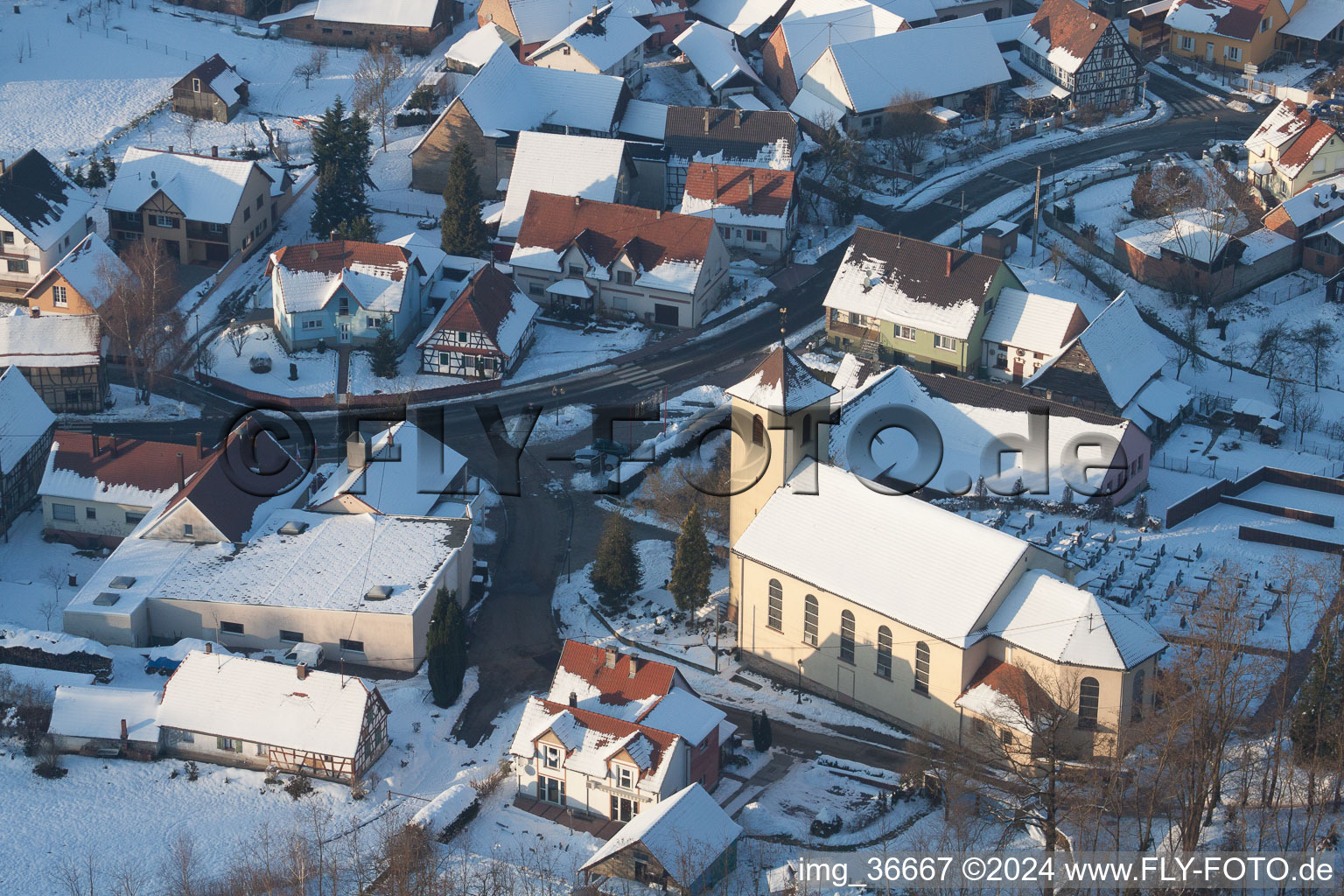 Aerial view of In winter when there is snow in Neewiller-près-Lauterbourg in the state Bas-Rhin, France